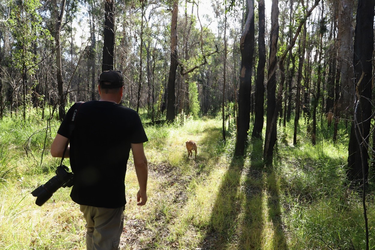 Landholder Jimmy Malecki and his dog, Junior