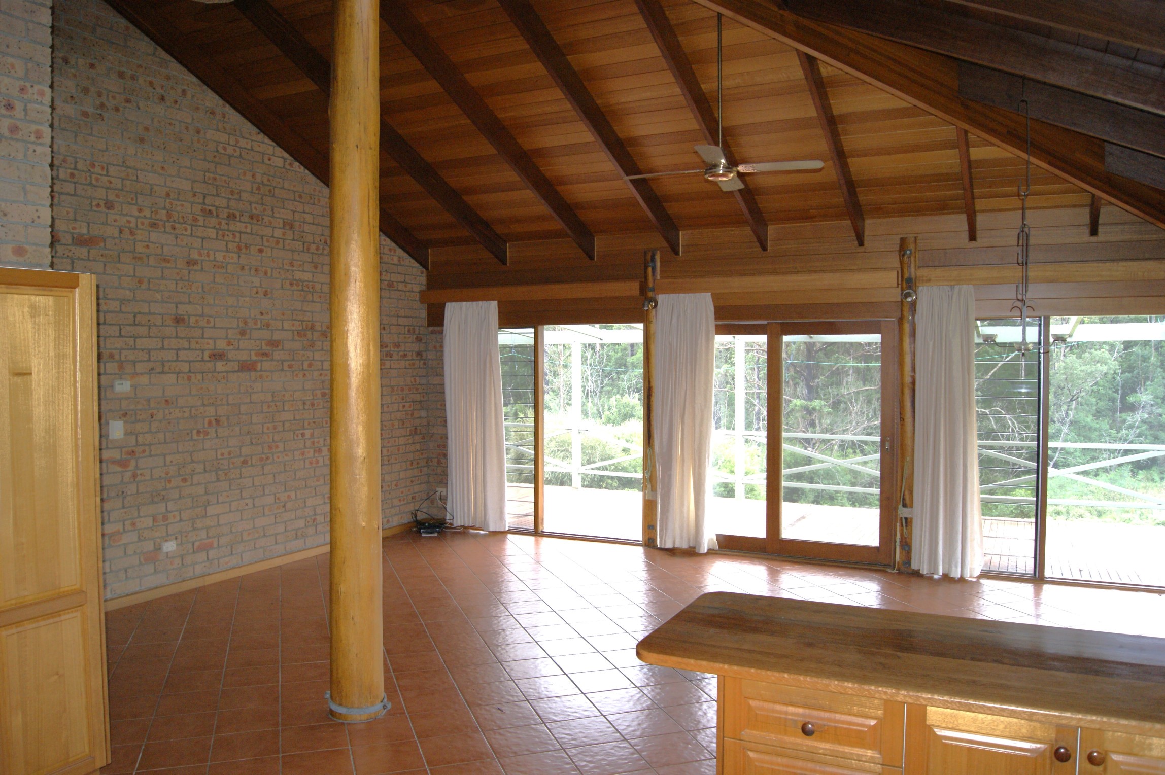 A view of the living area with wooden floors