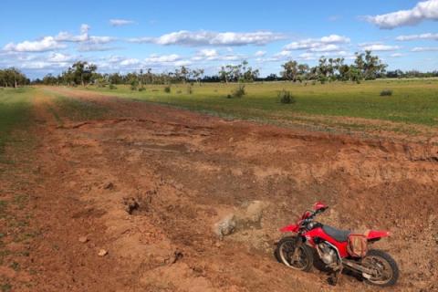 Rathgar Station flood washout Motorbike on washed out dirt road